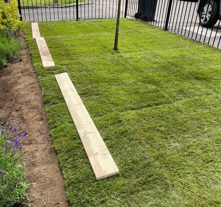 Professionally installed fence and secure gate around a property, enhancing security, privacy, property value, and controlled access, with clear boundary definition.